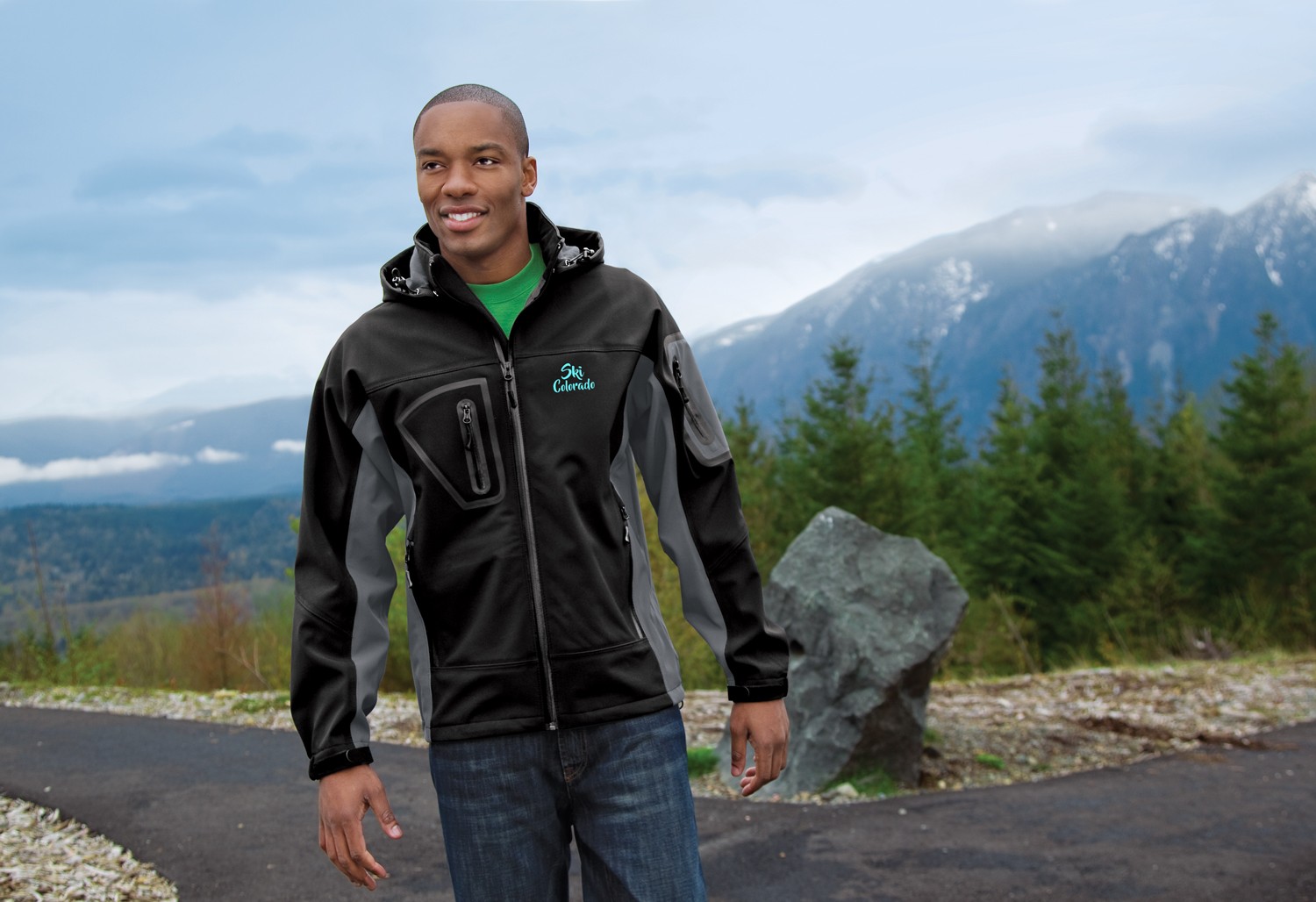 man hiking wearing custom printed outdoor jacket