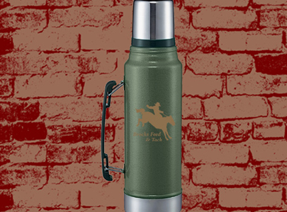Green Stanley Thermos with Silverl Lid that doubles as a cup imprinted with Colorado Bucking Bronco Logo